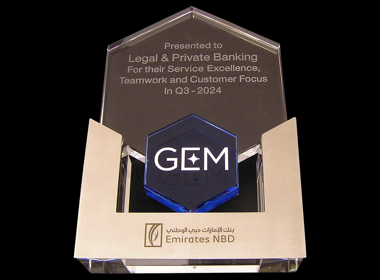 Bespoke corporate glass award with engraved lettering